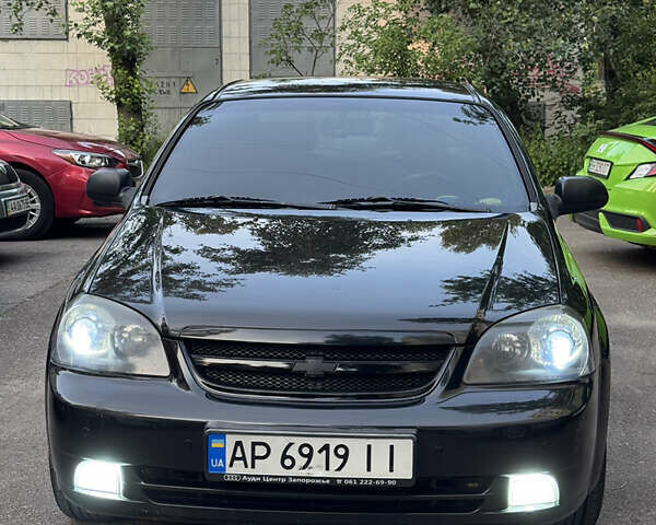 Черный Шевроле Лачетти, объемом двигателя 1.6 л и пробегом 252 тыс. км за 5700 $, фото 1 на Automoto.ua
