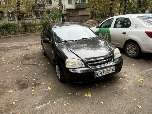 Черный Шевроле Лачетти, объемом двигателя 1.6 л и пробегом 250 тыс. км за 3500 $, фото 1 на Automoto.ua