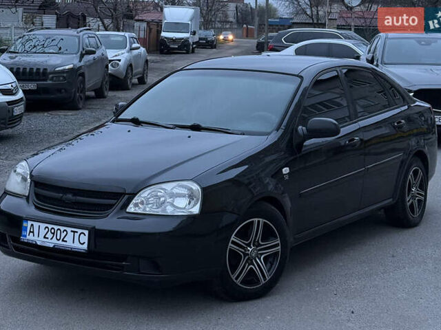 Черный Шевроле Лачетти, объемом двигателя 1.6 л и пробегом 233 тыс. км за 3750 $, фото 1 на Automoto.ua
