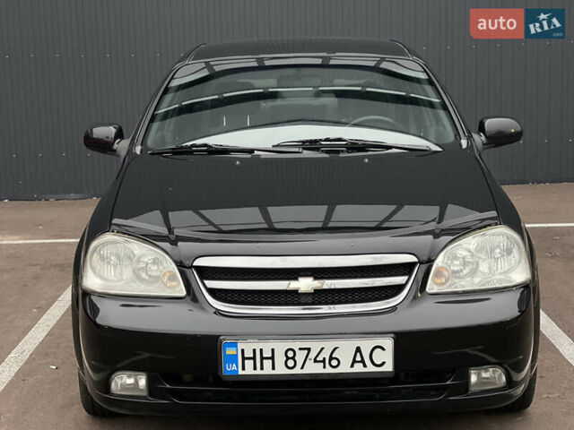 Черный Шевроле Лачетти, объемом двигателя 1.8 л и пробегом 170 тыс. км за 4400 $, фото 1 на Automoto.ua