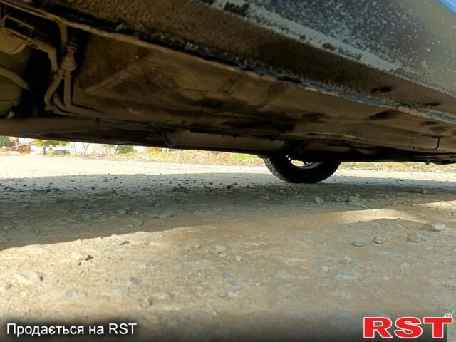 Черный Шевроле Лачетти, объемом двигателя 1.6 л и пробегом 200 тыс. км за 5300 $, фото 1 на Automoto.ua