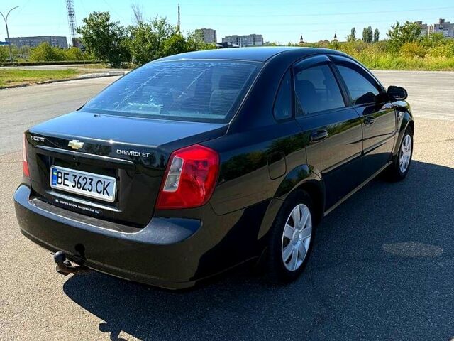 Черный Шевроле Лачетти, объемом двигателя 1.8 л и пробегом 145 тыс. км за 4800 $, фото 1 на Automoto.ua