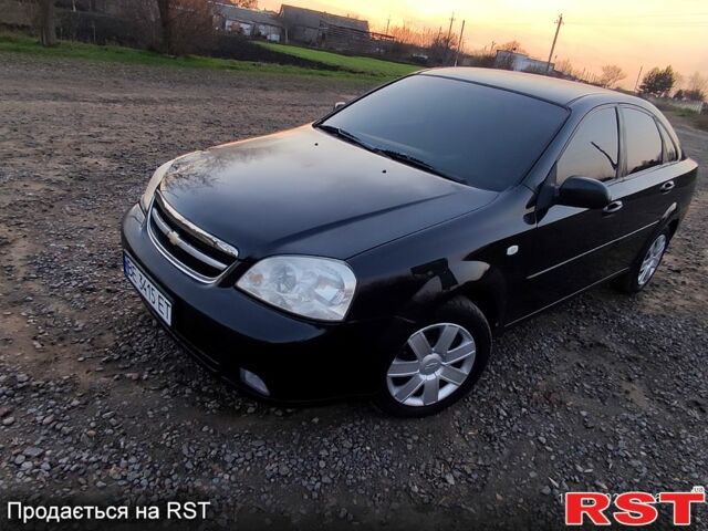 Черный Шевроле Лачетти, объемом двигателя 1.8 л и пробегом 244 тыс. км за 4200 $, фото 1 на Automoto.ua