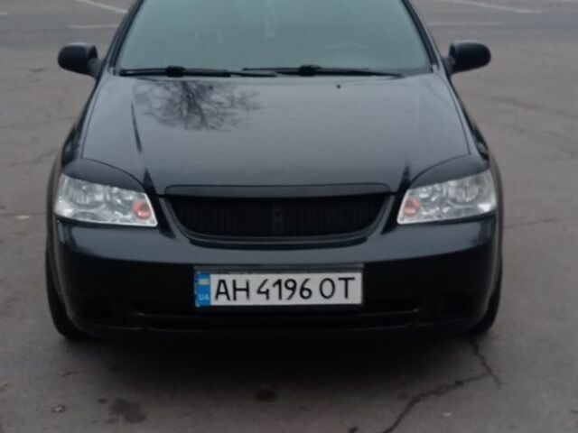 Черный Шевроле Лачетти, объемом двигателя 1.6 л и пробегом 138 тыс. км за 5500 $, фото 1 на Automoto.ua