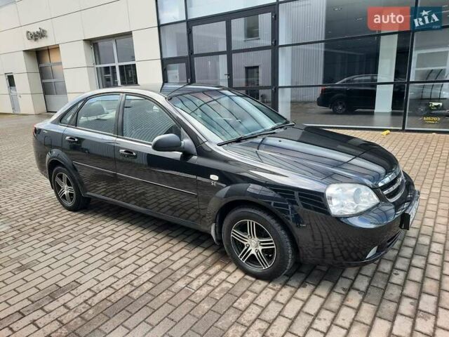 Черный Шевроле Лачетти, объемом двигателя 1.6 л и пробегом 246 тыс. км за 3999 $, фото 1 на Automoto.ua