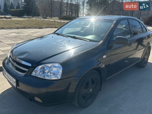Черный Шевроле Лачетти, объемом двигателя 1.6 л и пробегом 604 тыс. км за 4000 $, фото 1 на Automoto.ua
