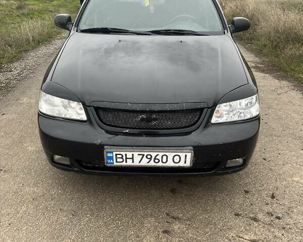Черный Шевроле Лачетти, объемом двигателя 1.6 л и пробегом 300 тыс. км за 3300 $, фото 1 на Automoto.ua