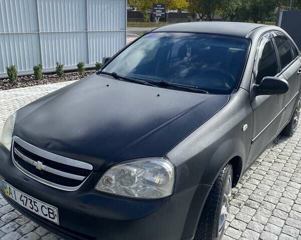 Черный Шевроле Лачетти, объемом двигателя 1.6 л и пробегом 302 тыс. км за 3900 $, фото 1 на Automoto.ua