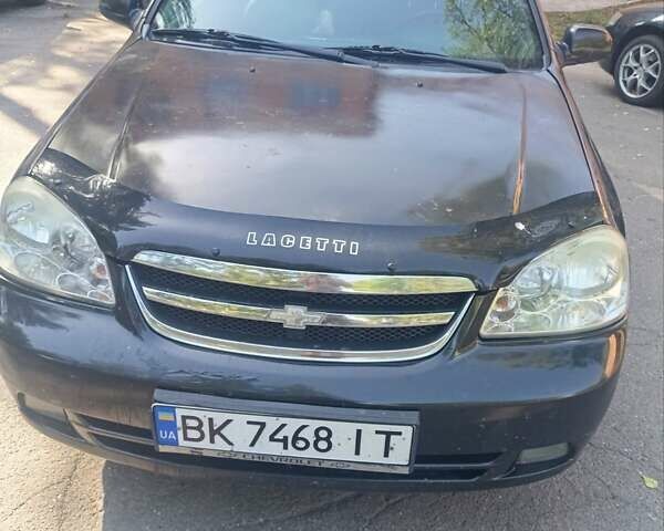 Черный Шевроле Лачетти, объемом двигателя 1.8 л и пробегом 181 тыс. км за 4200 $, фото 1 на Automoto.ua