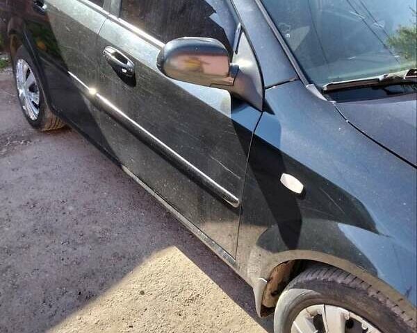 Черный Шевроле Лачетти, объемом двигателя 1.8 л и пробегом 290 тыс. км за 3700 $, фото 1 на Automoto.ua