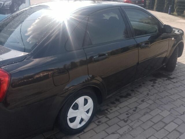 Черный Шевроле Лачетти, объемом двигателя 1.8 л и пробегом 235 тыс. км за 3400 $, фото 1 на Automoto.ua