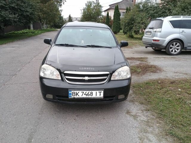 Черный Шевроле Лачетти, объемом двигателя 1.8 л и пробегом 200 тыс. км за 2100 $, фото 1 на Automoto.ua