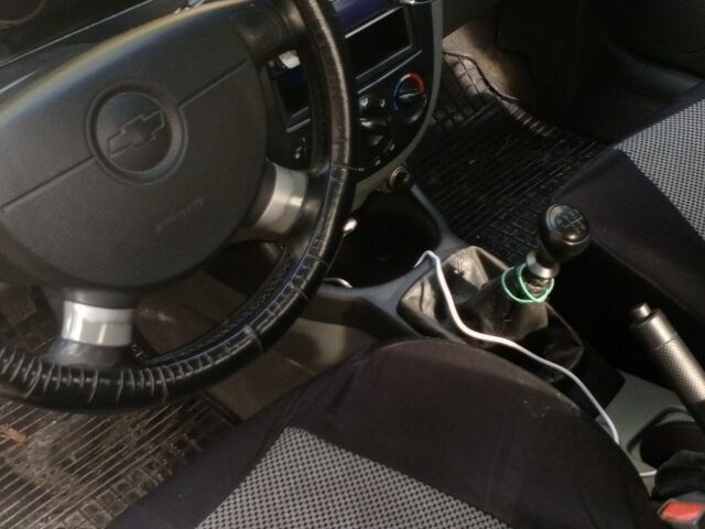 Черный Шевроле Лачетти, объемом двигателя 1.8 л и пробегом 294 тыс. км за 4000 $, фото 1 на Automoto.ua