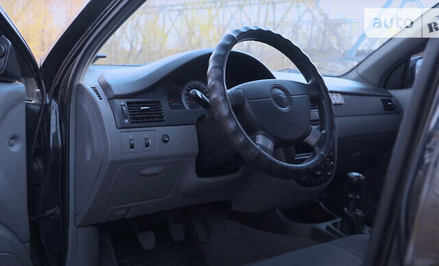 Черный Шевроле Лачетти, объемом двигателя 1.6 л и пробегом 83 тыс. км за 5400 $, фото 1 на Automoto.ua