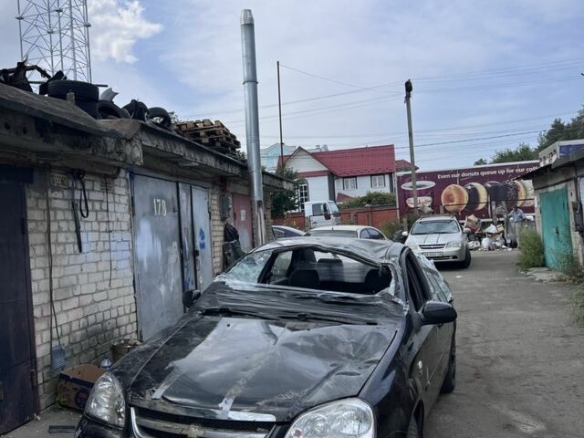 Черный Шевроле Лачетти, объемом двигателя 1.8 л и пробегом 300 тыс. км за 1000 $, фото 1 на Automoto.ua