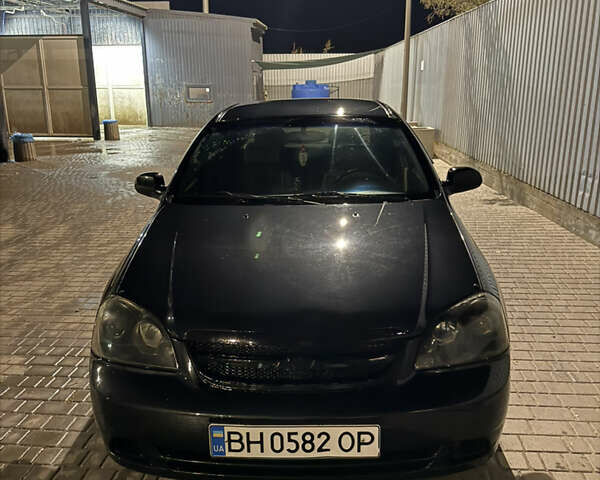 Черный Шевроле Лачетти, объемом двигателя 1.8 л и пробегом 296 тыс. км за 5300 $, фото 1 на Automoto.ua