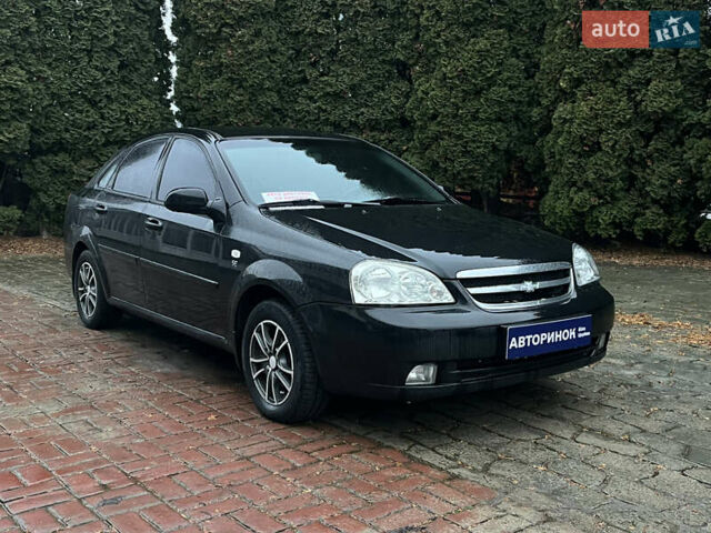 Черный Шевроле Лачетти, объемом двигателя 1.6 л и пробегом 228 тыс. км за 5200 $, фото 1 на Automoto.ua