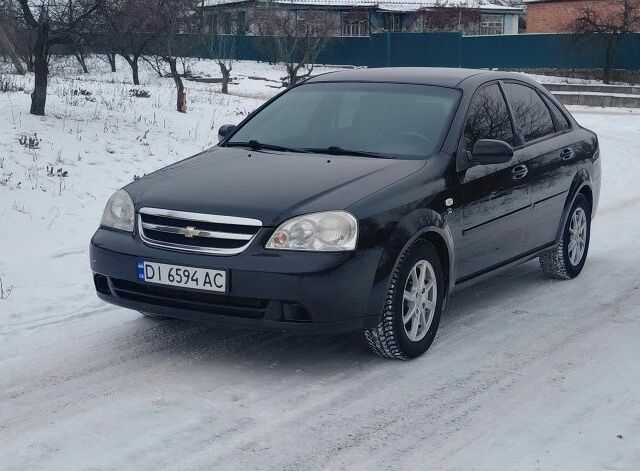 Черный Шевроле Лачетти, объемом двигателя 1.8 л и пробегом 163 тыс. км за 4650 $, фото 1 на Automoto.ua