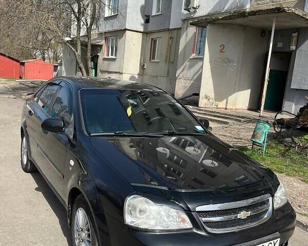 Черный Шевроле Лачетти, объемом двигателя 1.6 л и пробегом 145 тыс. км за 5250 $, фото 1 на Automoto.ua