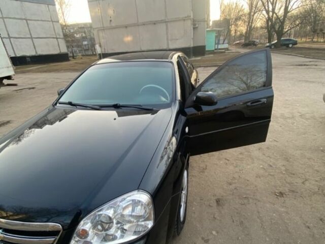 Черный Шевроле Лачетти, объемом двигателя 1.6 л и пробегом 160 тыс. км за 5000 $, фото 1 на Automoto.ua