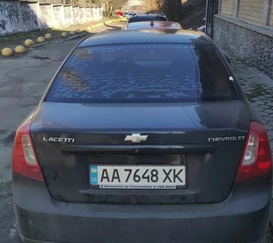 Черный Шевроле Лачетти, объемом двигателя 1.8 л и пробегом 304 тыс. км за 4800 $, фото 1 на Automoto.ua