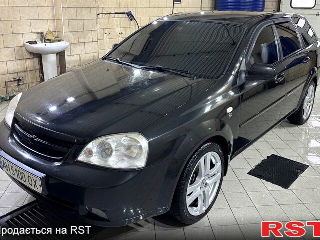 Черный Шевроле Лачетти, объемом двигателя 1.8 л и пробегом 320 тыс. км за 4000 $, фото 1 на Automoto.ua