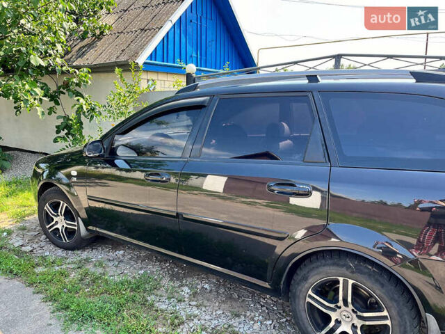 Черный Шевроле Лачетти, объемом двигателя 1.8 л и пробегом 188 тыс. км за 4500 $, фото 1 на Automoto.ua