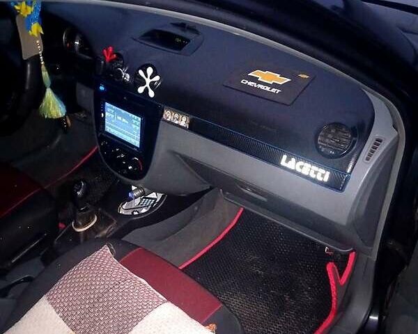 Черный Шевроле Лачетти, объемом двигателя 1.8 л и пробегом 32 тыс. км за 2800 $, фото 1 на Automoto.ua