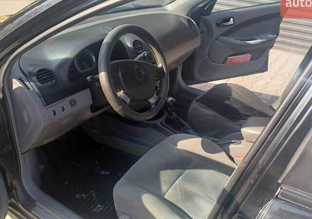 Чорний Шевроле Лачетті, об'ємом двигуна 1.8 л та пробігом 187 тис. км за 3972 $, фото 1 на Automoto.ua