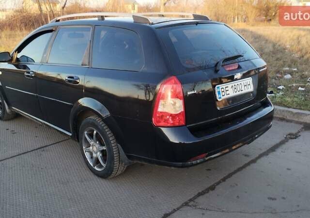 Черный Шевроле Лачетти, объемом двигателя 1.8 л и пробегом 210 тыс. км за 3800 $, фото 1 на Automoto.ua