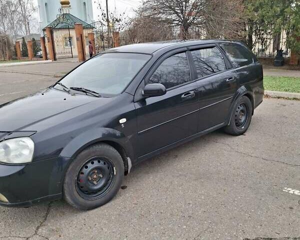 Черный Шевроле Лачетти, объемом двигателя 1.8 л и пробегом 335 тыс. км за 4000 $, фото 1 на Automoto.ua