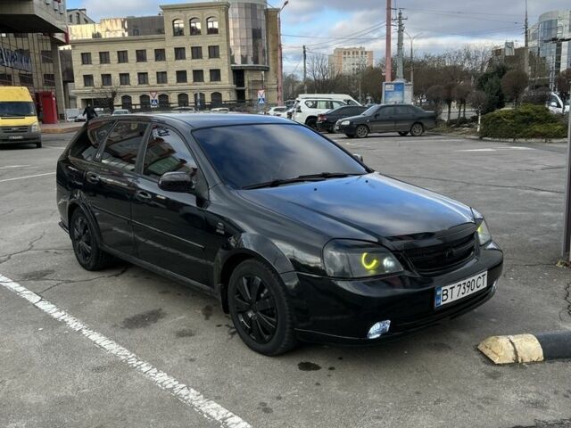 Черный Шевроле Лачетти, объемом двигателя 1.8 л и пробегом 200 тыс. км за 3450 $, фото 1 на Automoto.ua