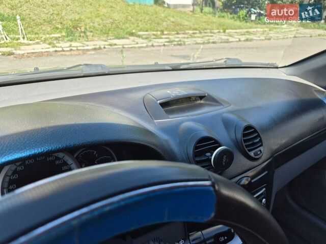 Черный Шевроле Лачетти, объемом двигателя 1.8 л и пробегом 358 тыс. км за 2100 $, фото 1 на Automoto.ua