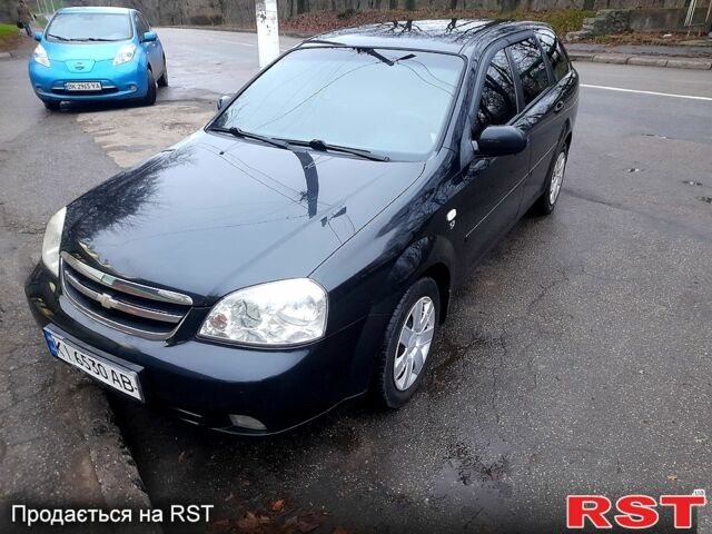 Черный Шевроле Лачетти, объемом двигателя 1.8 л и пробегом 240 тыс. км за 4350 $, фото 1 на Automoto.ua