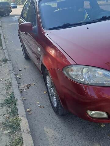 Красный Шевроле Лачетти, объемом двигателя 1.8 л и пробегом 280 тыс. км за 5700 $, фото 1 на Automoto.ua