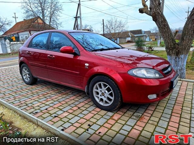 Красный Шевроле Лачетти, объемом двигателя 1.8 л и пробегом 200 тыс. км за 4600 $, фото 1 на Automoto.ua