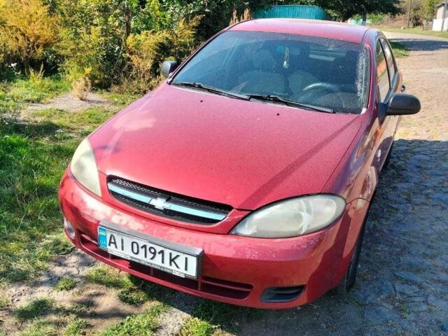 Красный Шевроле Лачетти, объемом двигателя 1.6 л и пробегом 303 тыс. км за 3300 $, фото 1 на Automoto.ua