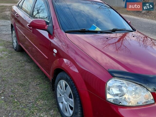 Красный Шевроле Лачетти, объемом двигателя 1.8 л и пробегом 136 тыс. км за 5700 $, фото 1 на Automoto.ua