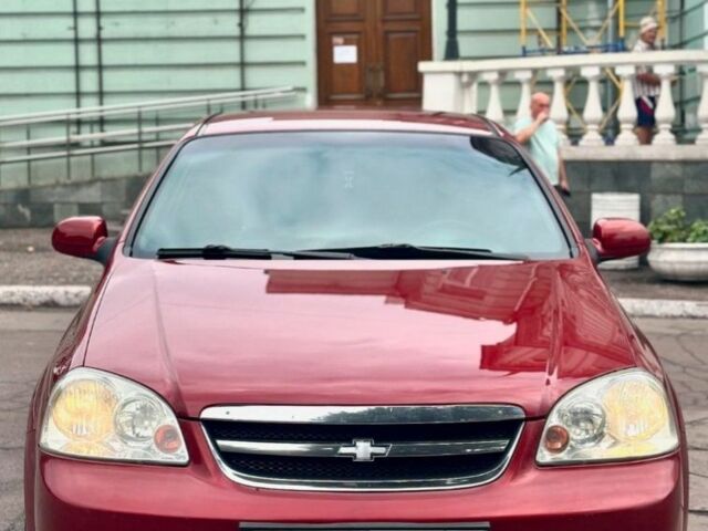 Красный Шевроле Лачетти, объемом двигателя 1.8 л и пробегом 380 тыс. км за 3700 $, фото 1 на Automoto.ua