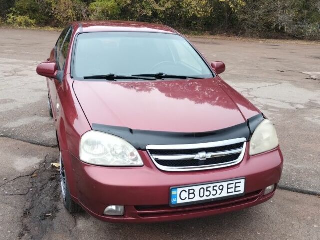 Красный Шевроле Лачетти, объемом двигателя 1.8 л и пробегом 136 тыс. км за 4200 $, фото 1 на Automoto.ua