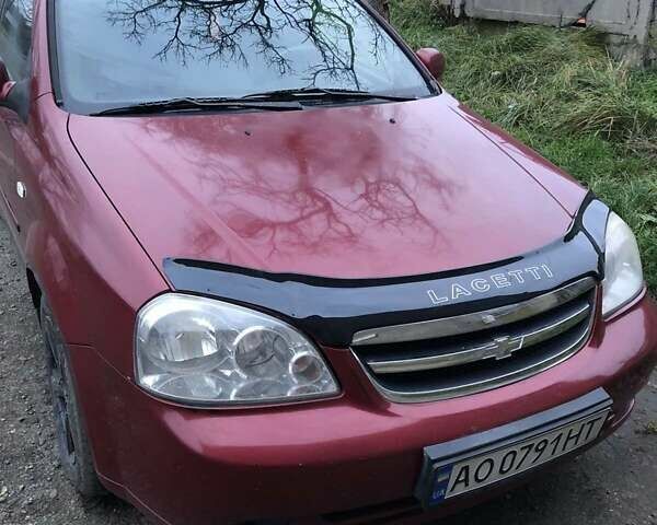 Красный Шевроле Лачетти, объемом двигателя 1.8 л и пробегом 250 тыс. км за 2700 $, фото 1 на Automoto.ua