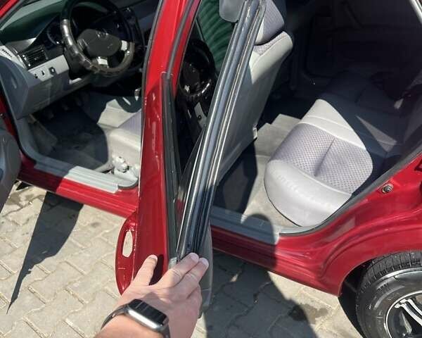 Красный Шевроле Лачетти, объемом двигателя 1.6 л и пробегом 370 тыс. км за 5000 $, фото 1 на Automoto.ua