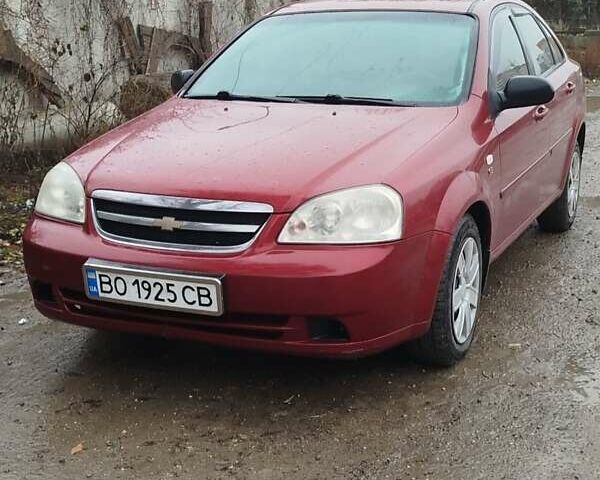 Красный Шевроле Лачетти, объемом двигателя 1.6 л и пробегом 235 тыс. км за 3850 $, фото 1 на Automoto.ua