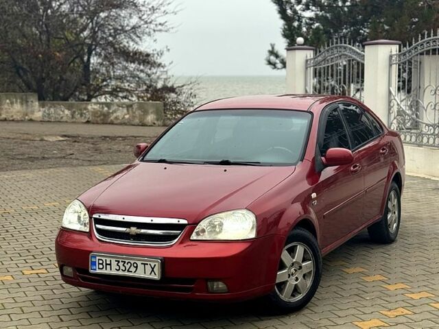 Червоний Шевроле Лачетті, об'ємом двигуна 1.8 л та пробігом 267 тис. км за 3900 $, фото 1 на Automoto.ua
