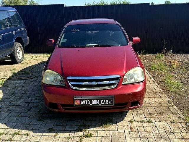 Красный Шевроле Лачетти, объемом двигателя 1.8 л и пробегом 240 тыс. км за 2800 $, фото 1 на Automoto.ua
