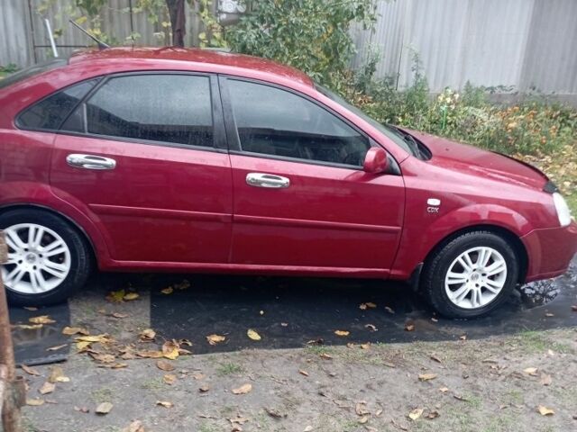 Красный Шевроле Лачетти, объемом двигателя 1.8 л и пробегом 246 тыс. км за 4500 $, фото 1 на Automoto.ua