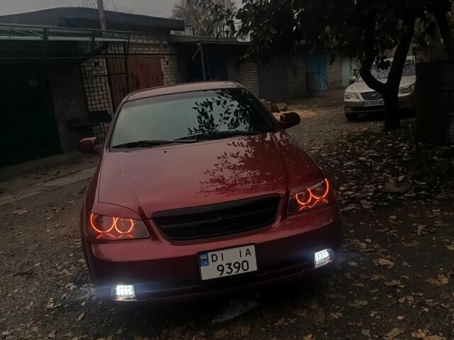 Красный Шевроле Лачетти, объемом двигателя 1.8 л и пробегом 211 тыс. км за 5200 $, фото 1 на Automoto.ua