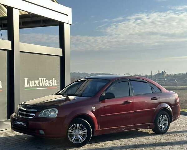 Красный Шевроле Лачетти, объемом двигателя 1.6 л и пробегом 280 тыс. км за 3200 $, фото 1 на Automoto.ua