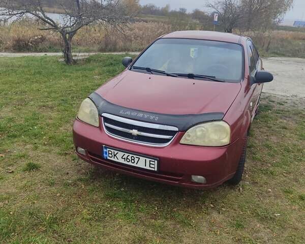 Красный Шевроле Лачетти, объемом двигателя 1.6 л и пробегом 296 тыс. км за 2900 $, фото 1 на Automoto.ua