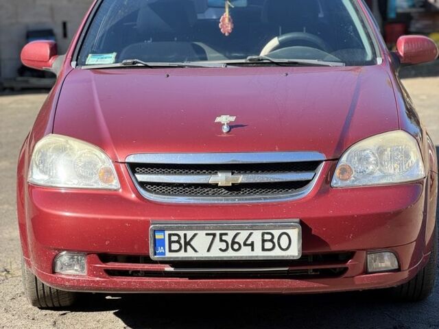 Червоний Шевроле Лачетті, об'ємом двигуна 1.8 л та пробігом 151 тис. км за 4467 $, фото 1 на Automoto.ua